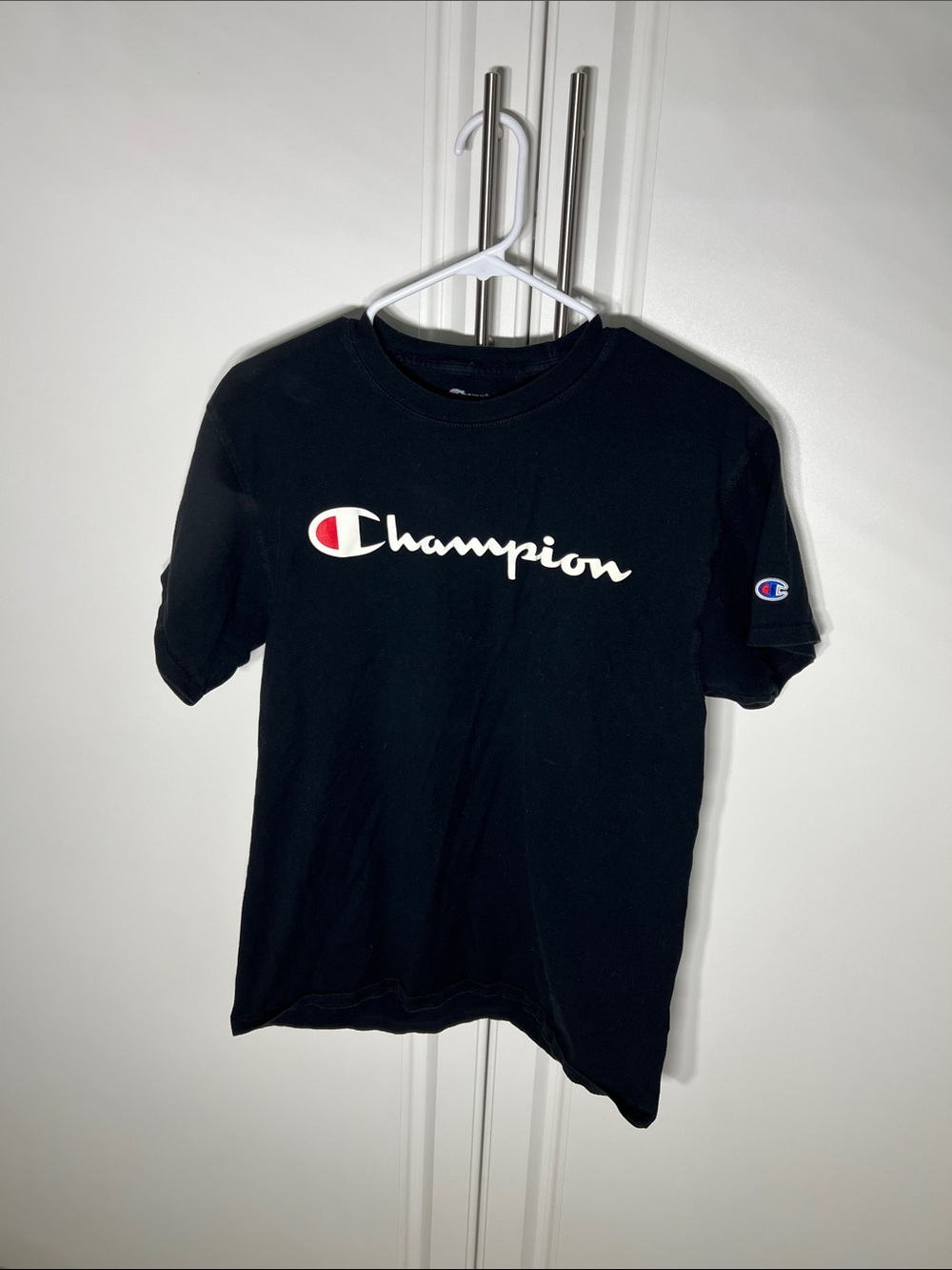 Champion Black Tee with White Script and Red Emblem